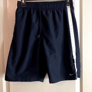 Men's size small Nike's swimming trunks with lining.